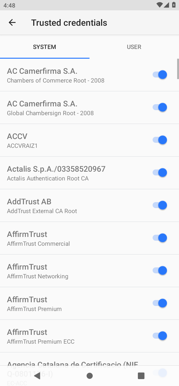 Android Trusted credentials screen with SYSTEM tab selected and the built-in CA list