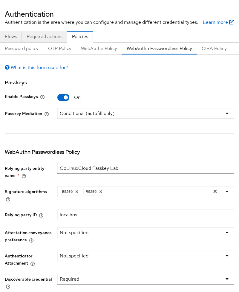 Keycloak WebAuthn Passwordless policy with Enable Passkeys on, conditional mediation, RP ID localhost, Discoverable Credential required, and User Verification required